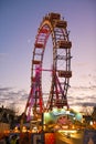 Ferris wheel in the evening in the large amusement park `Prater` in Vienna, Austria, Europe Royalty Free Stock Photo